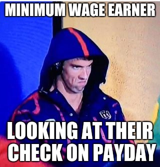 Michael Phelps Death Stare | MINIMUM WAGE EARNER; LOOKING AT THEIR CHECK ON PAYDAY | image tagged in memes,michael phelps death stare | made w/ Imgflip meme maker