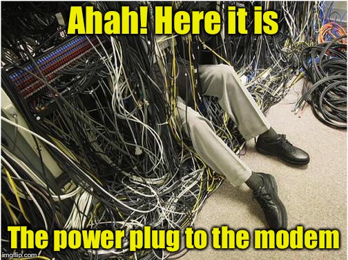 Have you tried unplugging and plugging it back in? | Ahah! Here it is; The power plug to the modem | image tagged in network | made w/ Imgflip meme maker