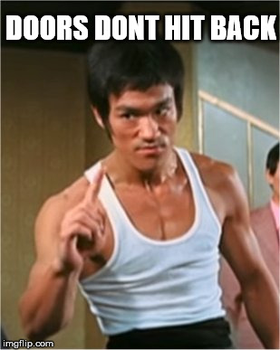 Bruce Lee on boards, doors, and iphone 8. | DOORS DONT HIT BACK | image tagged in bruce lee finger,funny memes,cool,am i the only one around here,the most interesting man in the world,chuck norris with guns | made w/ Imgflip meme maker
