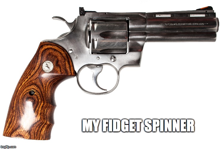 MY FIDGET SPINNER | image tagged in gun,fidget spinner,revolver | made w/ Imgflip meme maker