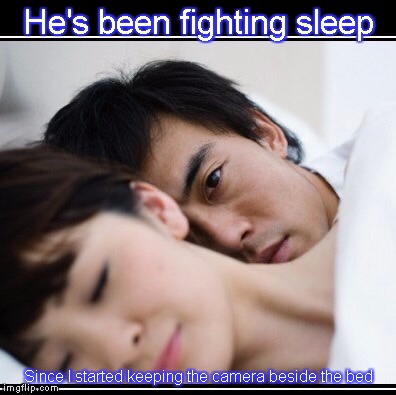 Sleeping on my pilow | He's been fighting sleep; Since I started keeping the camera beside the bed | image tagged in sleeping on my pilow | made w/ Imgflip meme maker