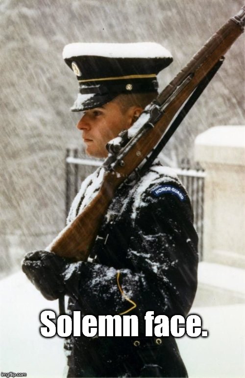 At the Tomb of the Unknowns, Arlington National Cemetery. 
 | Solemn face. | image tagged in honor guard,tomb of unknown,snow storm,arlington cemetery,arlington | made w/ Imgflip meme maker