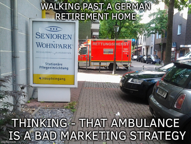 Alternative Interpretations | WALKING PAST A GERMAN RETIREMENT HOME; THINKING - THAT AMBULANCE IS A BAD MARKETING STRATEGY | image tagged in ambulance meets german retirement home,memes,funny,life,germany | made w/ Imgflip meme maker