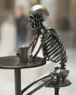 Still waiting skeleton at table with cup Blank Meme Template