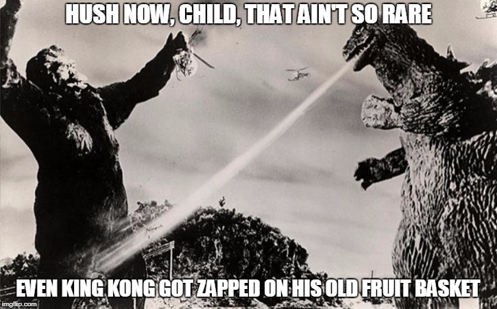 Some days you're Godzilla, some days you're Kong... but dang tho, Godzilla's gone completely Jurassic!   | HUSH NOW, CHILD, THAT AIN'T SO RARE; EVEN KING KONG GOT ZAPPED ON HIS OLD FRUIT BASKET | image tagged in evil godzilla,king kong,balls,life,funny,true story | made w/ Imgflip meme maker