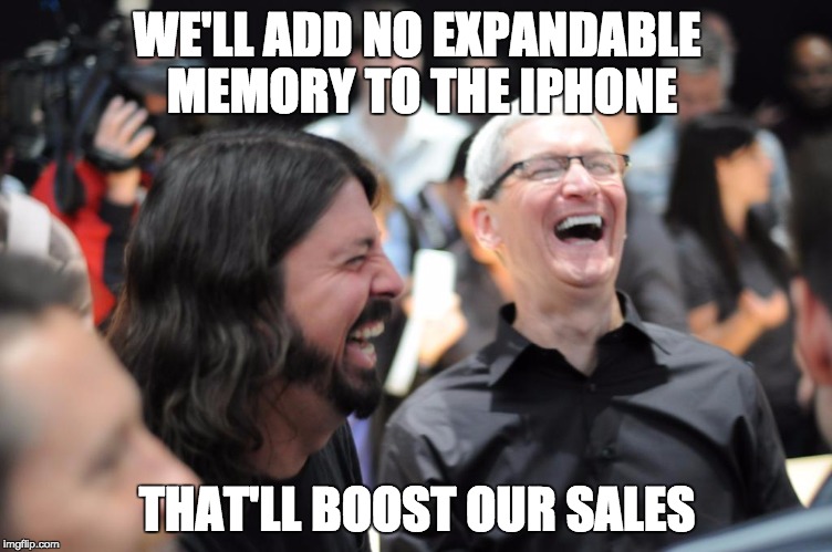 Tim Cook Laughing | WE'LL ADD NO EXPANDABLE MEMORY TO THE IPHONE; THAT'LL BOOST OUR SALES | image tagged in tim cook laughing | made w/ Imgflip meme maker