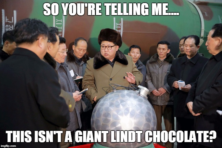 Kim Jung Un | SO YOU'RE TELLING ME.... THIS ISN'T A GIANT LINDT CHOCOLATE? | image tagged in kim jung un | made w/ Imgflip meme maker
