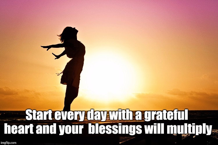 Grateful heart | Start every day with
a grateful heart and your 
blessings will multiply | image tagged in sunrise woman | made w/ Imgflip meme maker