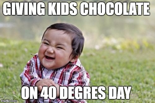 Evil Toddler | GIVING KIDS CHOCOLATE; ON 40 DEGRES DAY | image tagged in memes,evil toddler | made w/ Imgflip meme maker