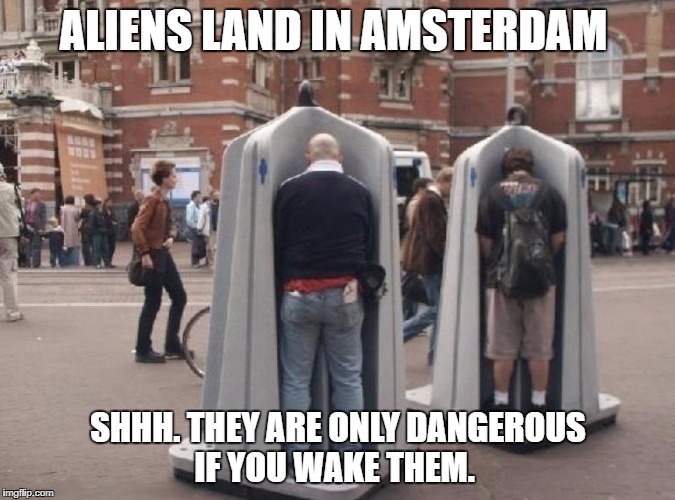 Alien Zombies Land in Europe | ALIENS LAND IN AMSTERDAM; SHHH. THEY ARE ONLY DANGEROUS IF YOU WAKE THEM. | image tagged in zombies,peeing,beer,football,horror | made w/ Imgflip meme maker