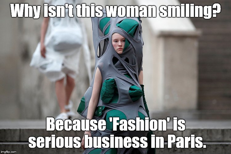 American Rick Owens' design for Spring-Summer 2018 ready-to-wear collection, Paris Fashion Week: Benoit Tastier photo, Reuters. | Why isn't this woman smiling? Because 'Fashion' is serious business in Paris. | image tagged in fashion,paris,you gottta be squidding me,the jokes on us,gotta see it to believe it,unbelievable | made w/ Imgflip meme maker