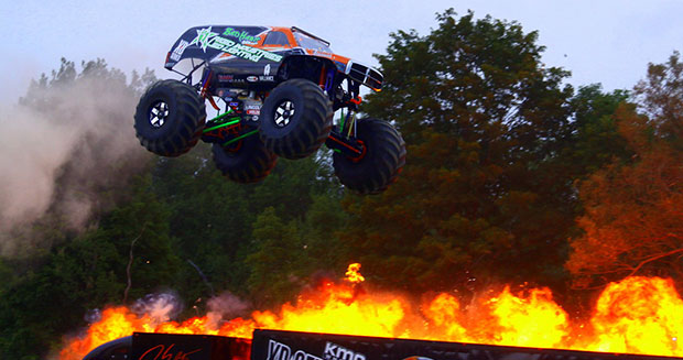 High Quality Monster truck jumping flames world record jump Blank Meme Template