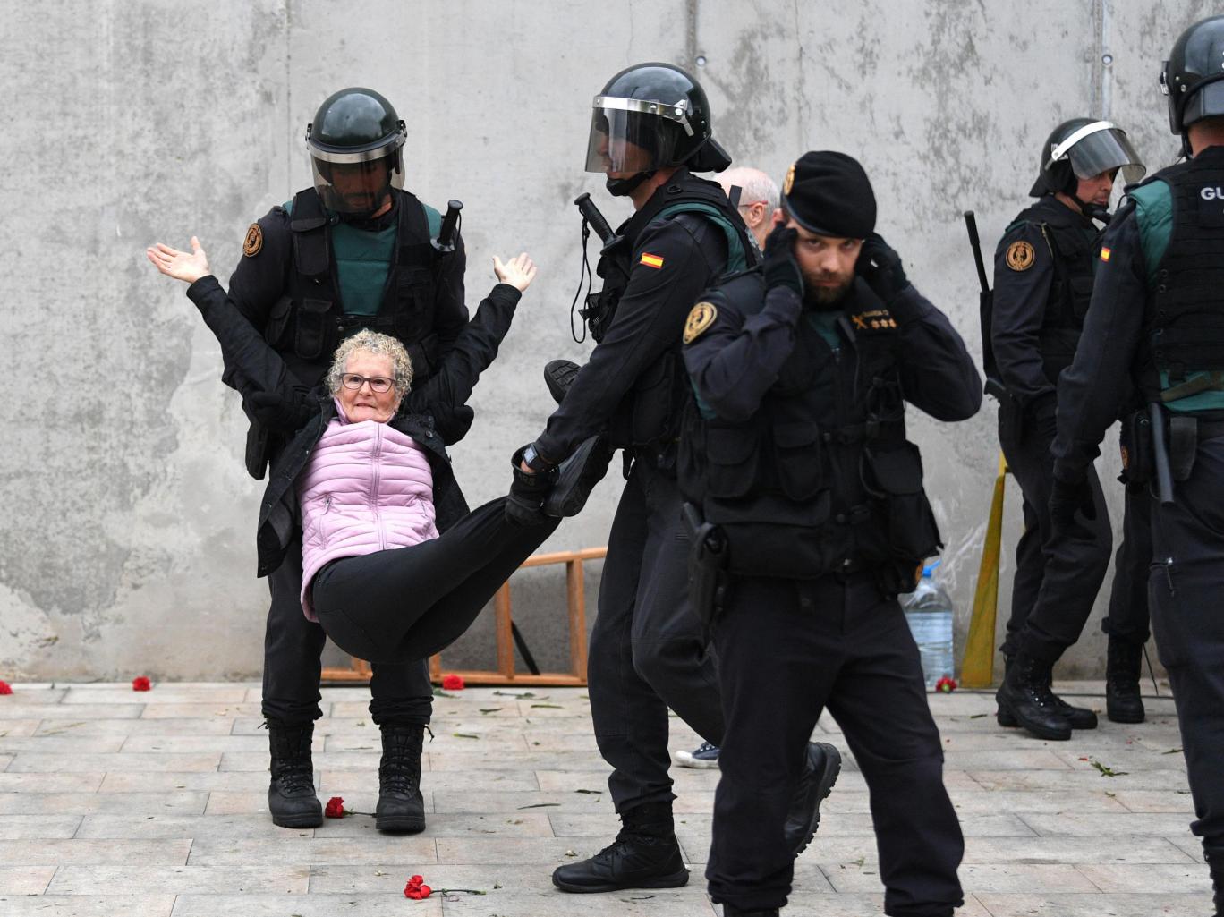 Catalonia police stop woman voting Blank Meme Template
