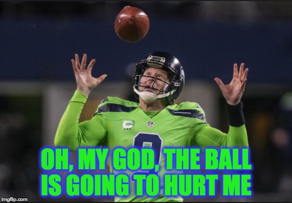 The football hurts | OH, MY GOD, THE BALL IS GOING TO HURT ME | image tagged in seahawks,funny,nfl,nfl memes,memes | made w/ Imgflip meme maker