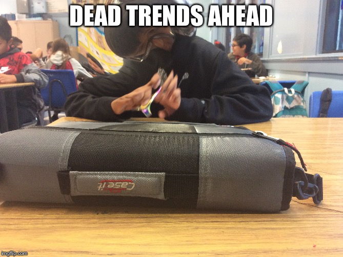 DEAD TRENDS AHEAD | image tagged in fidget spinner,dead meme | made w/ Imgflip meme maker