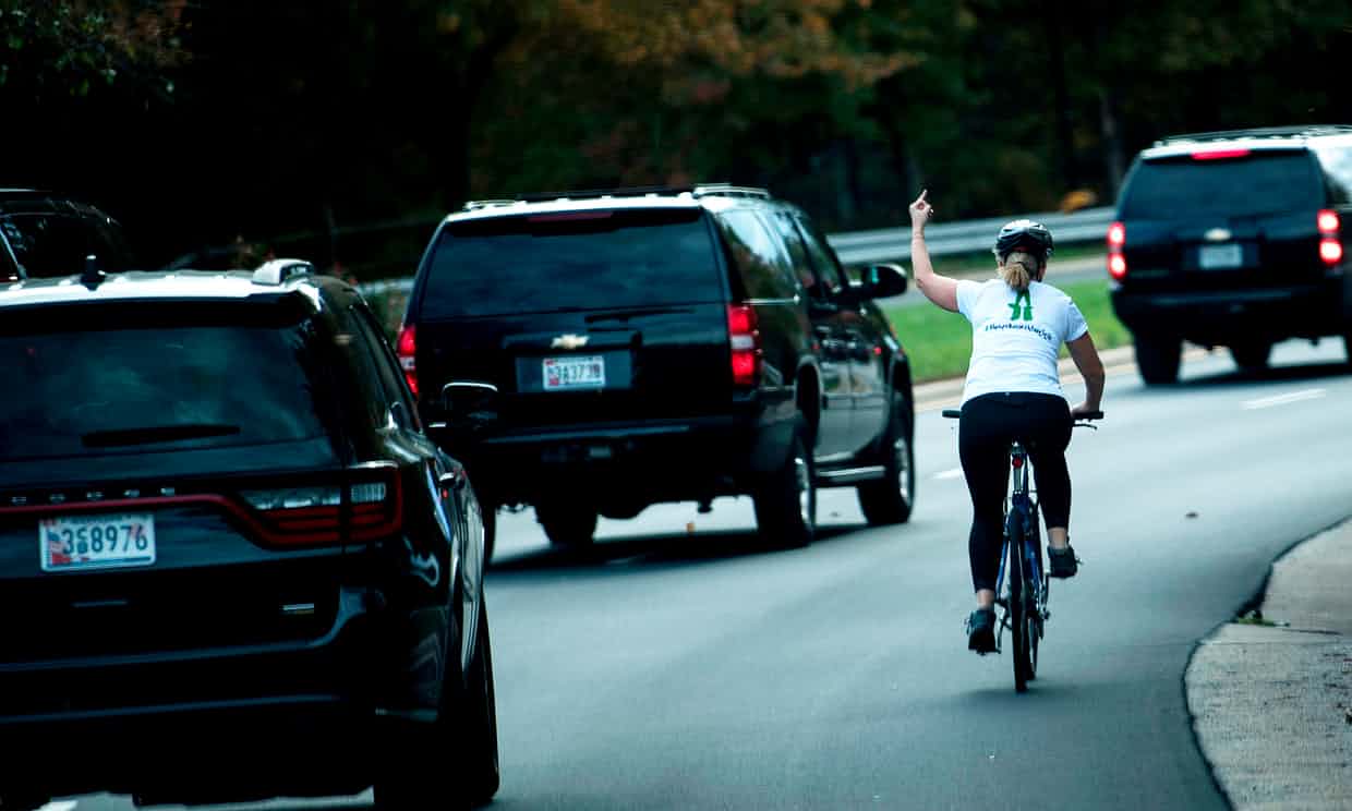 High Quality cyclist giving Trump the finger Blank Meme Template