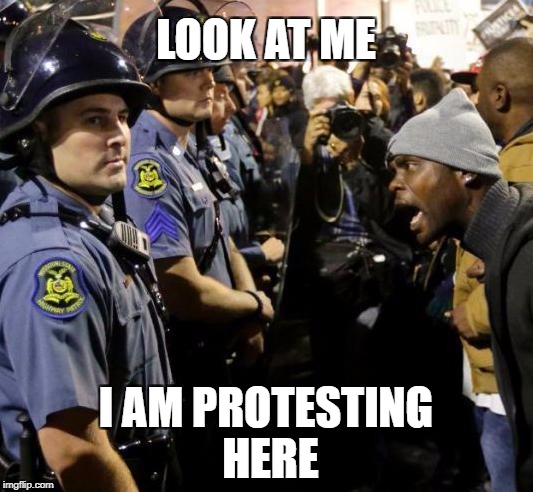 Protester | LOOK AT ME; I AM PROTESTING HERE | image tagged in protester | made w/ Imgflip meme maker