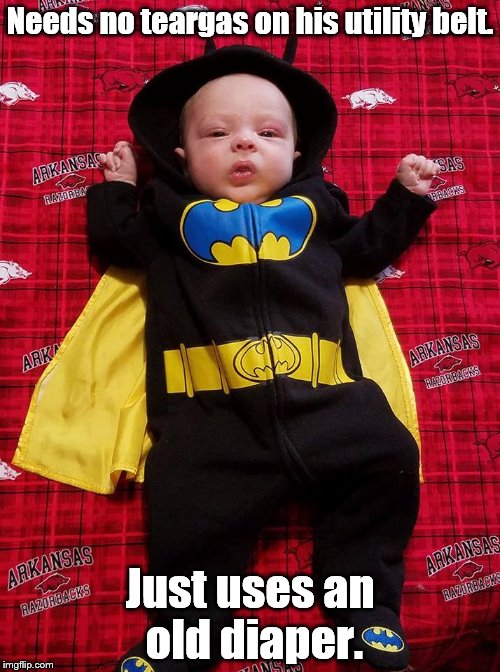 Needs no teargas! |  Needs no teargas on his utility belt. Just uses an old diaper. | image tagged in baby | made w/ Imgflip meme maker