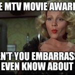 Lilly Von Schtupp | OOOOH, THE MTV MOVIE AWARDS ARE ON? AREN'T YOU EMBARRASSED TO EVEN KNOW ABOUT IT? | image tagged in lilly von schtupp,mtv,movies,awards,mtv movie awards | made w/ Imgflip meme maker