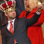 Ed Woodward wearing a crown