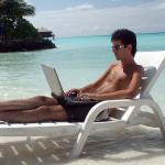 beach bum with laptop