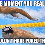 Michael Phelps | THE MOMENT YOU REALIZE; YA SHOULDN'T HAVE POKED THE TIGER | image tagged in michael phelps | made w/ Imgflip meme maker