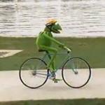 kermit riding a bike