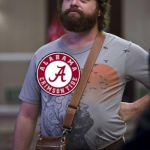 Alan - Hangover | IT'S NOT A PURSE, IT'S A SATCHEL; AND IT HOLDS 16 NATIONAL CHAMPIONSHIPS! | image tagged in alan - hangover | made w/ Imgflip meme maker