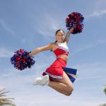 cheerleader jump with pom poms