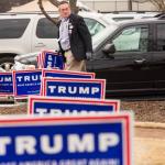 trump signs hillary clinton