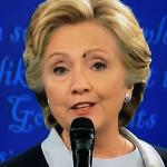 Hillary with fly on face