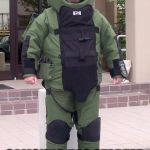 Bomb suit | IN AN EFFORT TO REPAIR ITS FAILING IMAGE; SAMSUNG HAS STARTED A NEW CORPORATE DRESS CODE | image tagged in bomb suit | made w/ Imgflip meme maker
