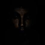 Face in Darkness