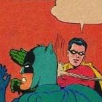 Robin slapping batman