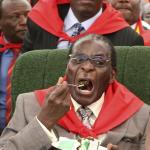 Robert Mugabe Eating Cake