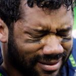 Russel Wilson Crying | GOD, WE SUCK! | image tagged in russel wilson crying | made w/ Imgflip meme maker