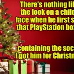 A fleeting moment of joy | There's nothing like the look on a child's face when he first sees that PlayStation box . . . containing the socks I got him for Christmas | image tagged in christmas present | made w/ Imgflip meme maker