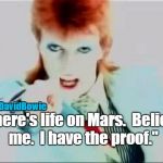 David bowie pointing | @realDavidBowie; "There's life on Mars.  Believe me.  I have the proof." | image tagged in david bowie pointing | made w/ Imgflip meme maker