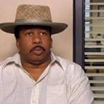Stanley from the office in a hat 