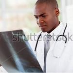 Doctor Reading X-Ray Hospital Chart meme
