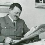 Hitler reading a newspaper