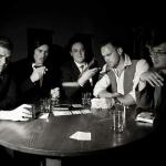 Five douchebags playing poker 