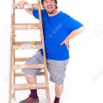 Smiling man on ladder