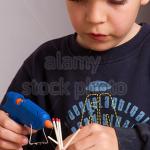 kid with glue gun