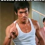 Bruce Lee on boards, doors, and iphone 8. | DOORS DONT HIT BACK | image tagged in bruce lee finger,funny memes,cool,am i the only one around here,the most interesting man in the world,chuck norris with guns | made w/ Imgflip meme maker