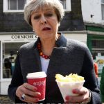 Theresa May | 'AVE A CHIP; THAT'S ABOUT ALL I'M OFFERING.... | image tagged in theresa may | made w/ Imgflip meme maker