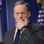 Sean Spicer with Mouth Covered