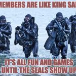 Navy SEALs in surf | ISIS MEMBERS ARE LIKE KING SALMON. IT'S ALL FUN AND GAMES UNTIL THE SEALS SHOW UP. | image tagged in navy seals in surf | made w/ Imgflip meme maker