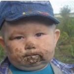 farmer toddler eating dirt