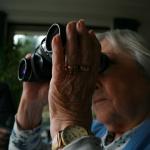 old lady with binoculars